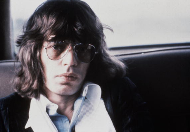 Mick Jagger wearing aviator sunglasses