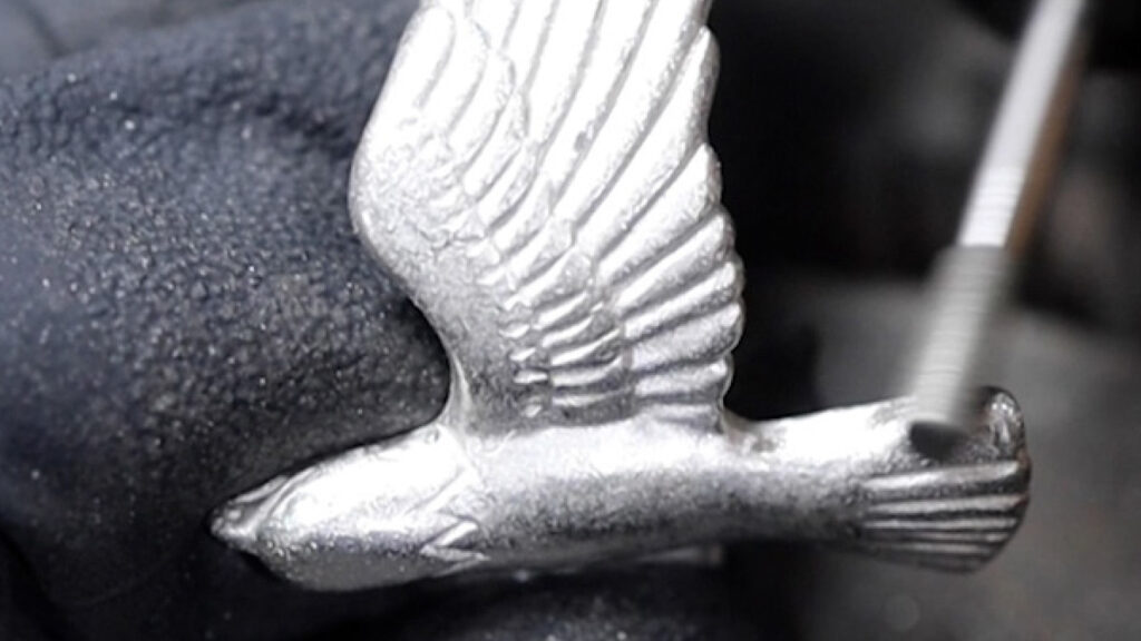 A Soaring Eagle emblem being hand-carved in Sterling Silver